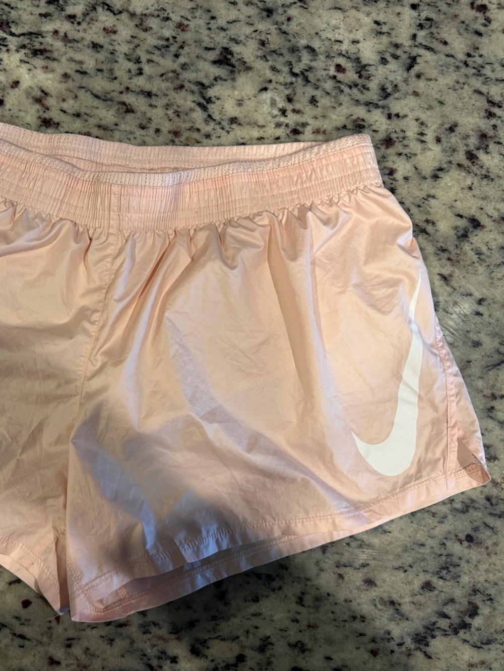 Nike Light Pink Athletic Shorts with White Swoosh